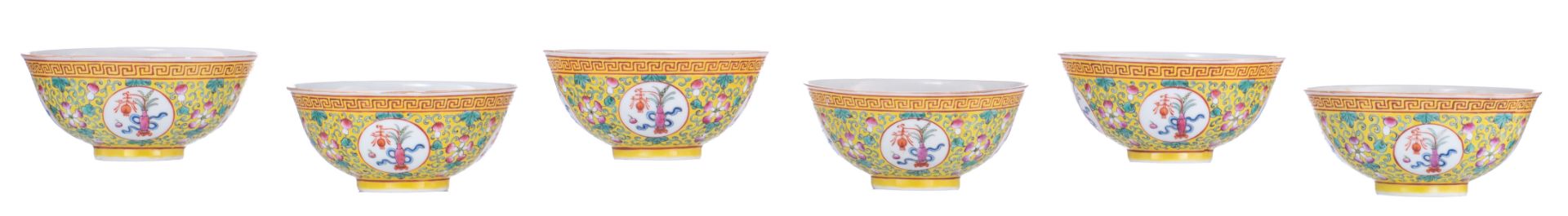 Six Chinese yellow ground famille rose floral decorated bowls, the panels with flower vases, the ins - Image 3 of 8