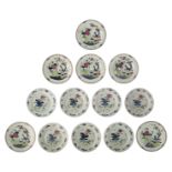 Seven Chinese famille rose floral decorated dishes; added six ditto dishes, the centre with butterfl