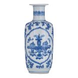 A Chinese blue and white floral decorated rouleau vase, the ogival panels with antiquities such as v