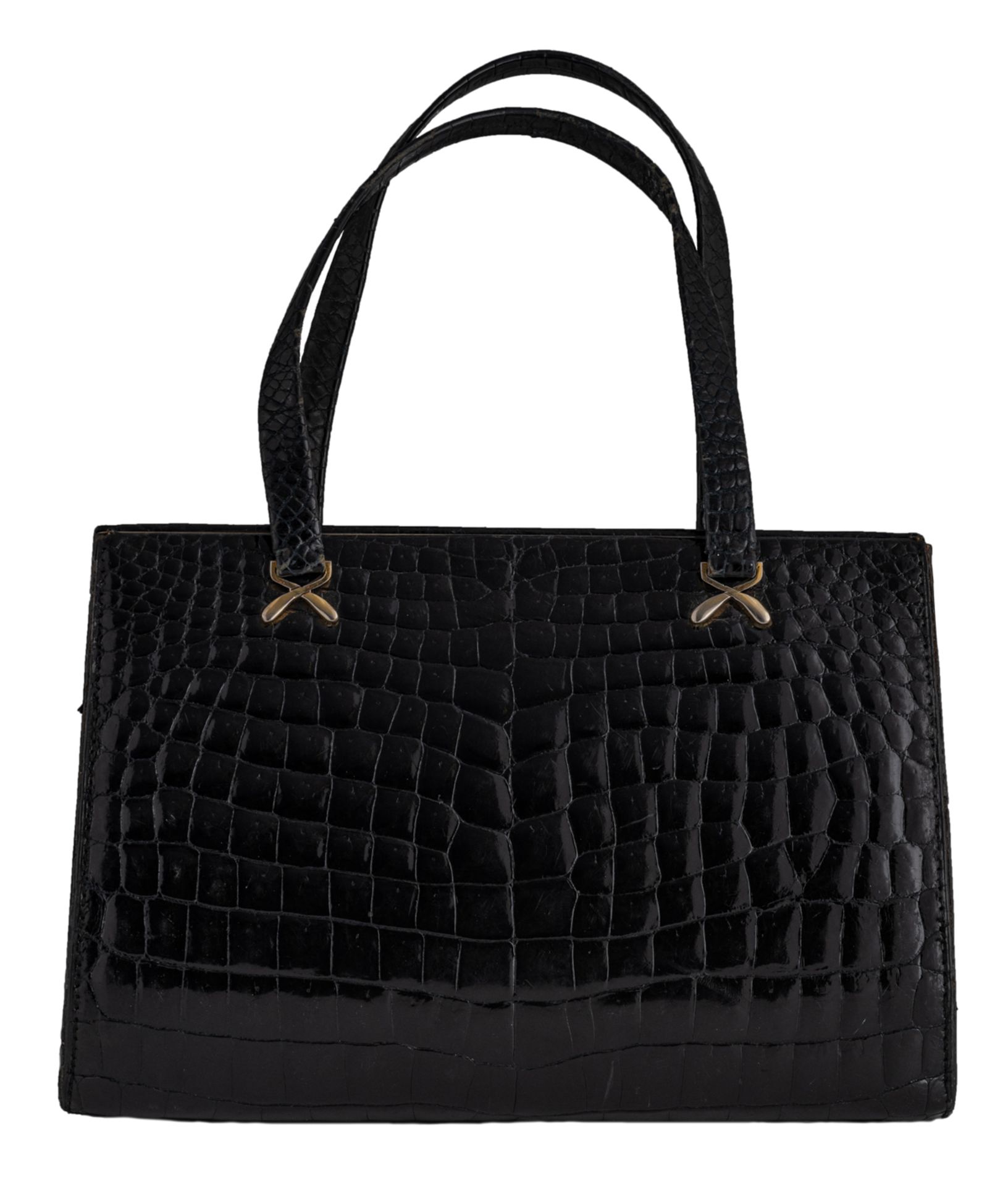 A Delvaux top handle handbag in black croco leather, H 18,5 x 28,5 cm