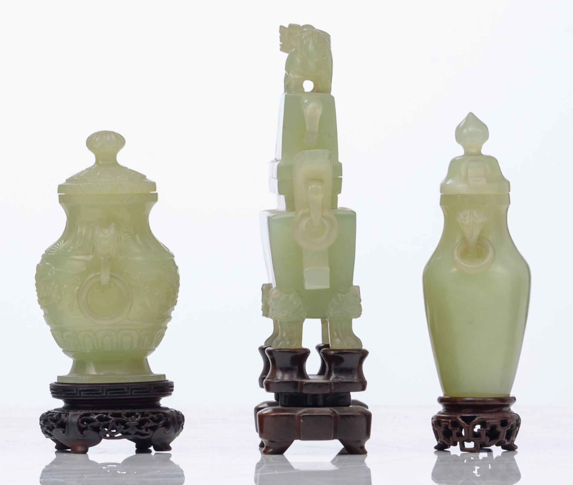 Three Chinese carved green jade vases and covers, Qing dynasty; added a Chinese carved smoky quartz - Image 4 of 14