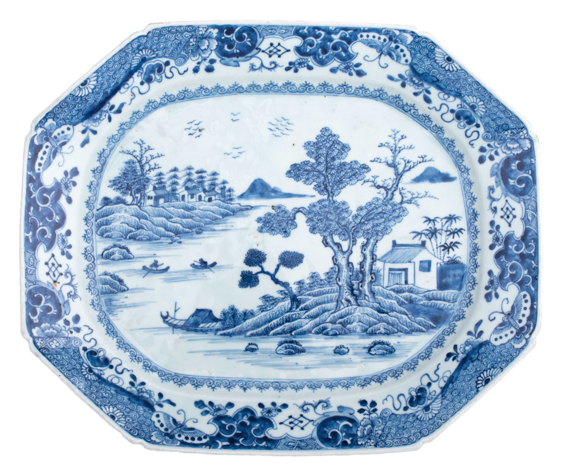 A large Chinese Nanking blue and white export porcelain octagonal plate, decorated with a river land