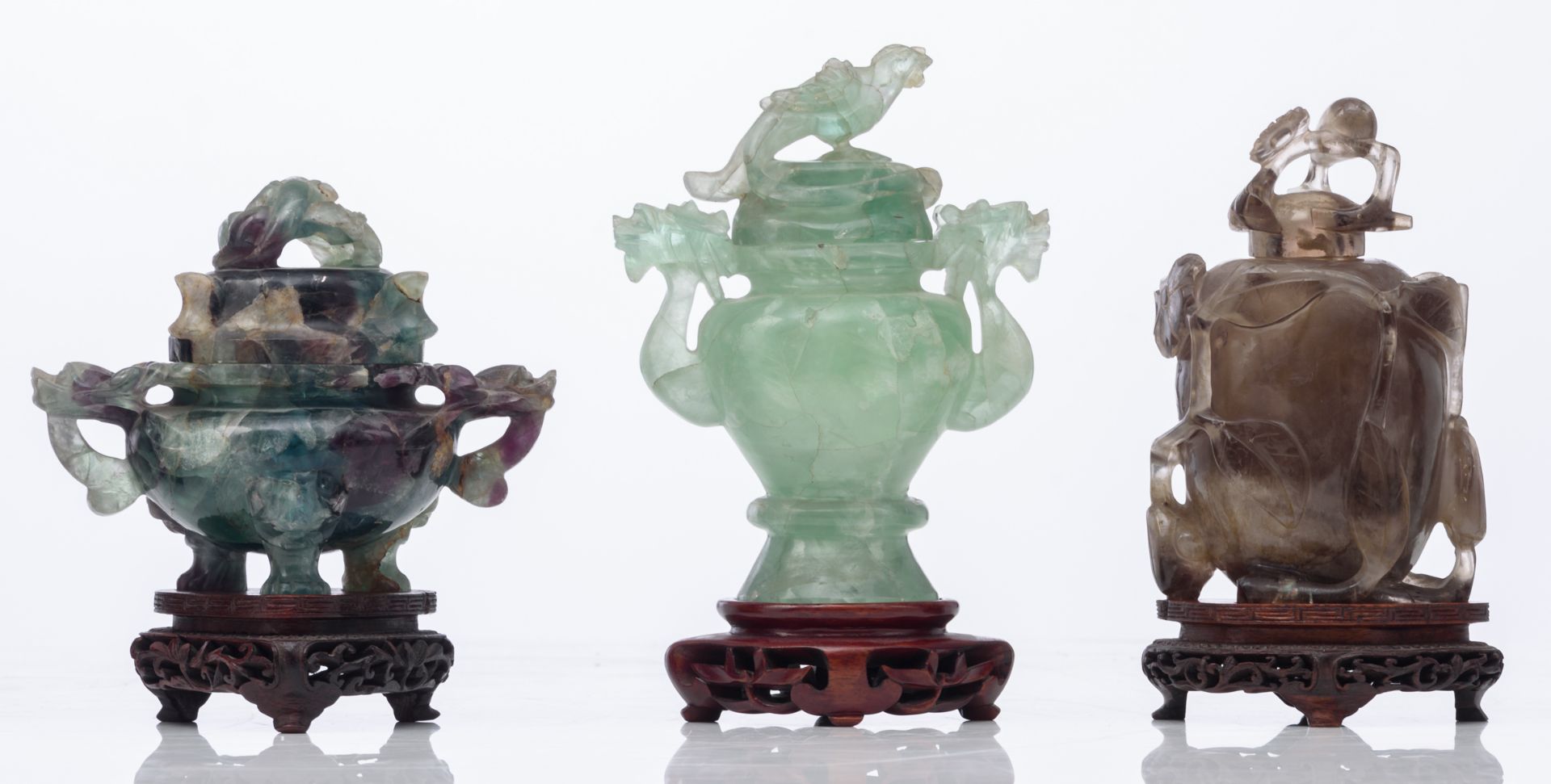 Three Chinese carved green jade vases and covers, Qing dynasty; added a Chinese carved smoky quartz - Image 11 of 14