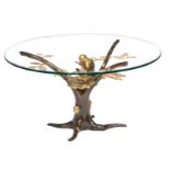 A vintage patinated and polished bronze design coffee table, the frame in the shape of a bird feedin