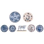 A collection of polychrome and blue and white floral decorated plates; added: a polychrome plate wit