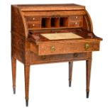 A very fine English George III burr walnut and mahogany veneered roll-top desk, the inside with a le
