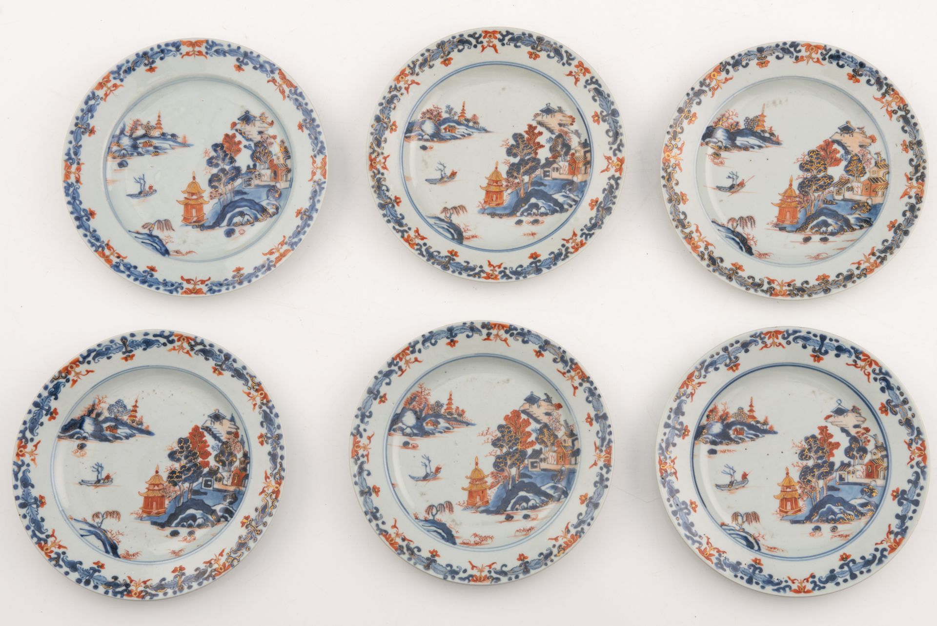 Six Chinese Imari decorated dishes, the centre with a pagoda in a mountainous river landscape, 18thC - Image 3 of 6