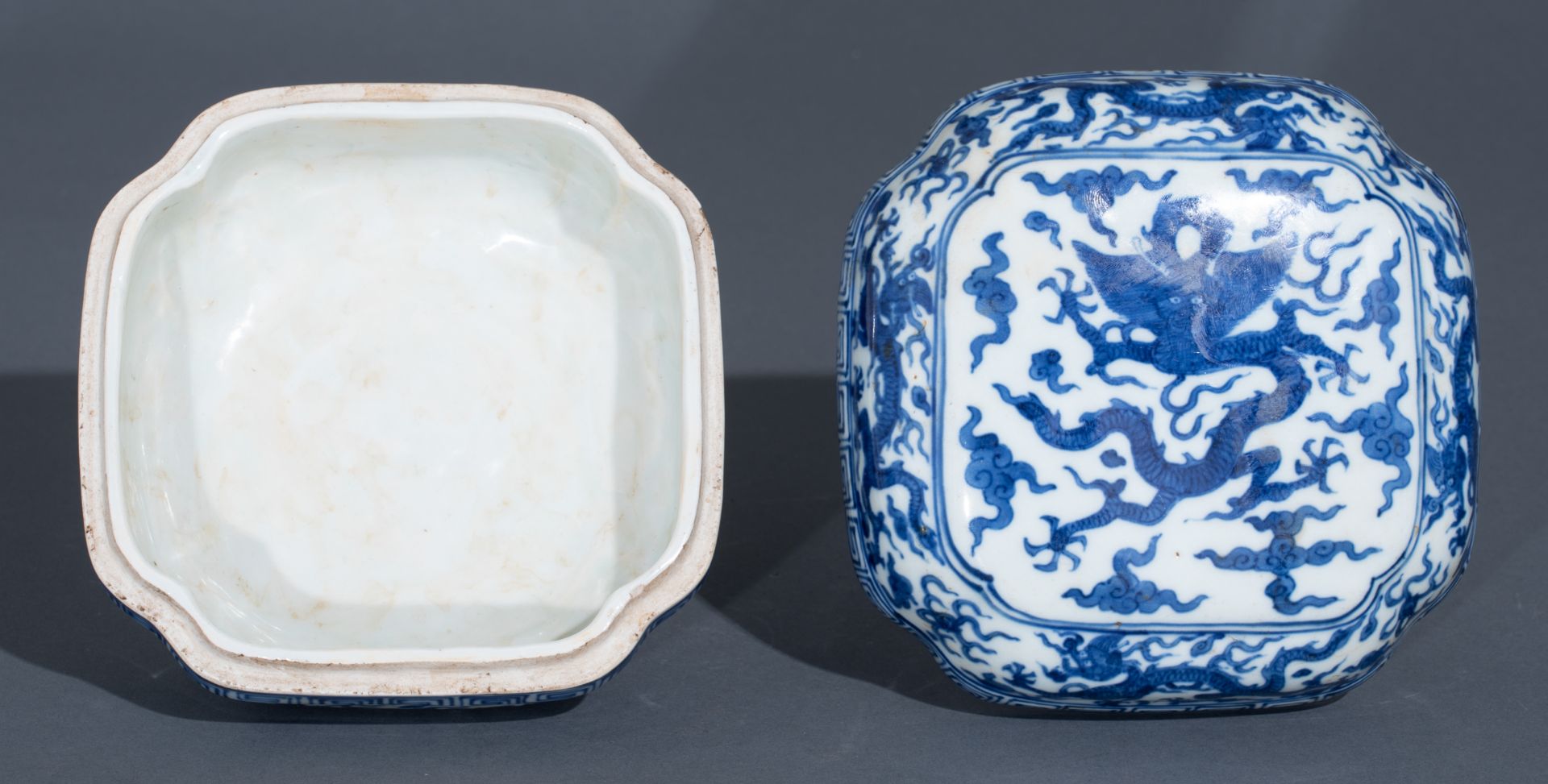 A Chinese Ming style blue and white rectangular box and cover, the top panel decorated with a dragon - Image 7 of 10