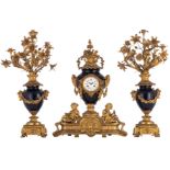 A gilt bronze three-piece mantle clock garniture, the clock with an allegory of art and science, the