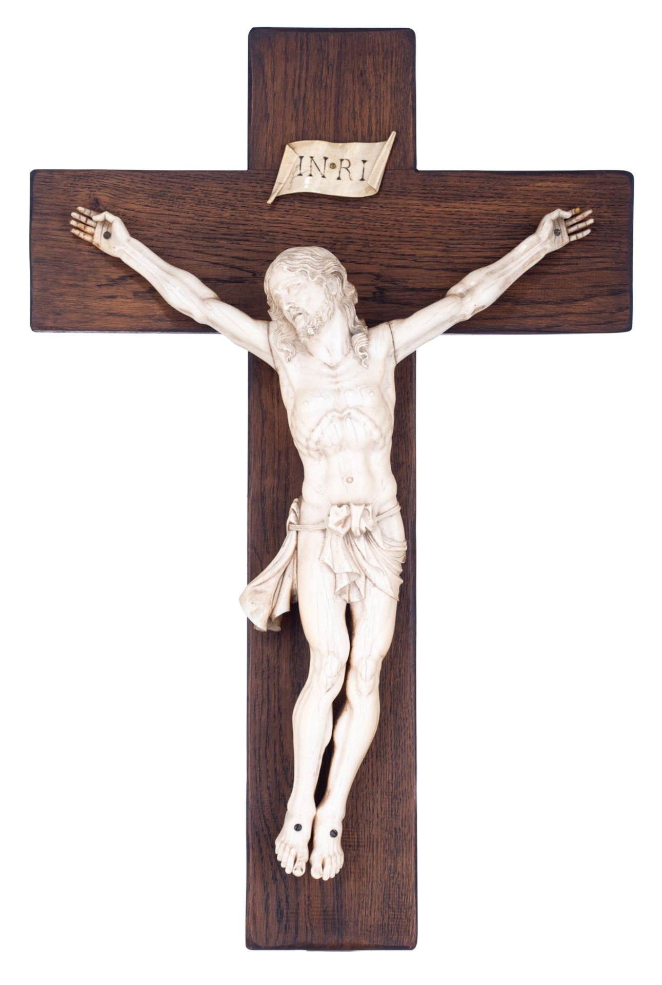 An imposing and fine sculpted ivory Corpus Christi on an oak crucifix, in the 17thC manner, 38 x 49