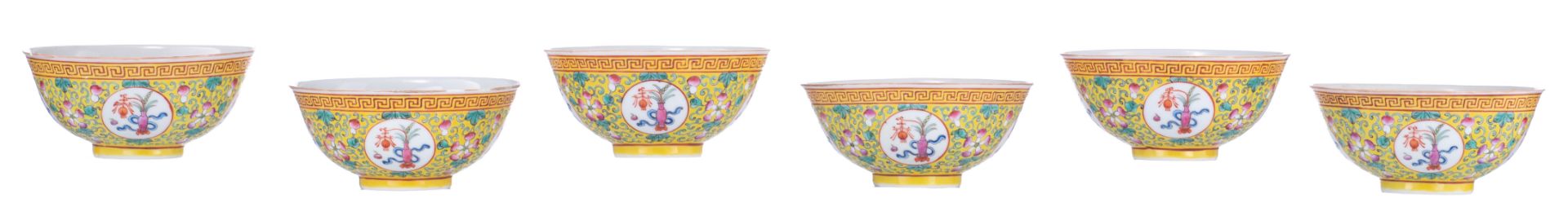 Six Chinese yellow ground famille rose floral decorated bowls, the panels with flower vases, the ins - Image 4 of 8