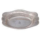 An 18thC probably French (Paris) silver Régence style bread basket, the well with an engraved coat o