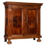 An imposing Dutch Baroque rosewood veneered two doors cupboard, each door with a star-shaped parquet