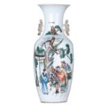 A Chinese polychrome vase, decorated with an animated scene with figures, the reverse with calligrap