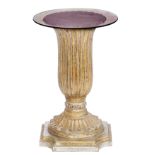 A Neoclassical patinated and gilt wooden column-shaped occasional table, with a glass top, H 68,5 -