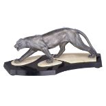 An Art Deco sculpture of a roaring panther, zamac on a noir Belge and green onyx base, H 18,5 - 24 -
