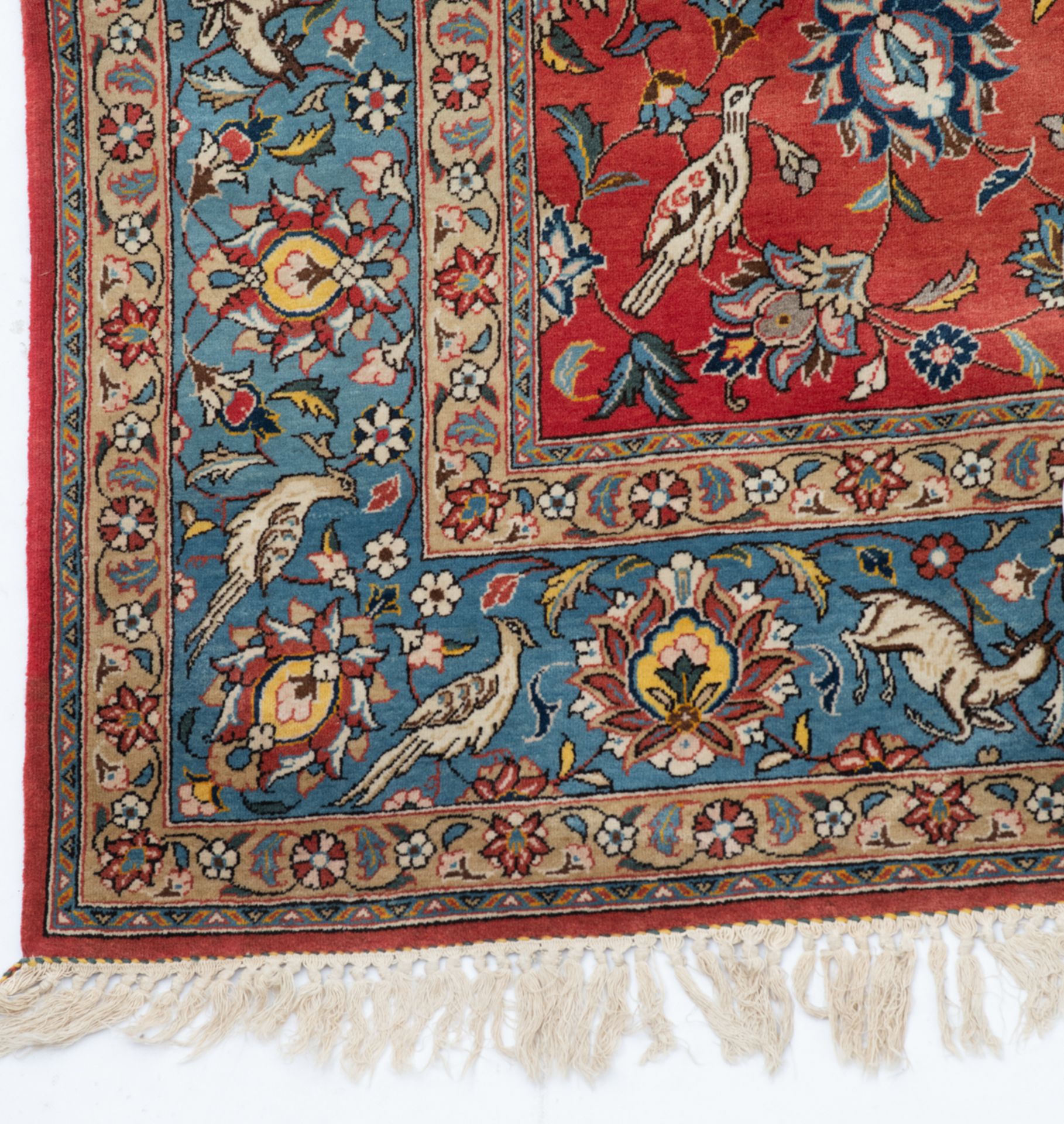 An Oriental woollen rug, decorated with hunting lions, deer and birds surrounded by flowers, 234 x 3 - Image 5 of 5