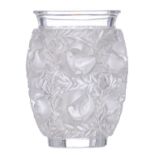 A crystal Lalique 'Bagatelle' vase, decorated with birds in a floral setting, signed, H 17 cm