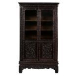A very richly carved Chinese exotic hardwood display cabinet, H 220 - W 132 - D 59 cm