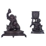 A Japanese bronze statue of the Buddhist god Daikoku, seated on a rat, on a base; added a ditto stat