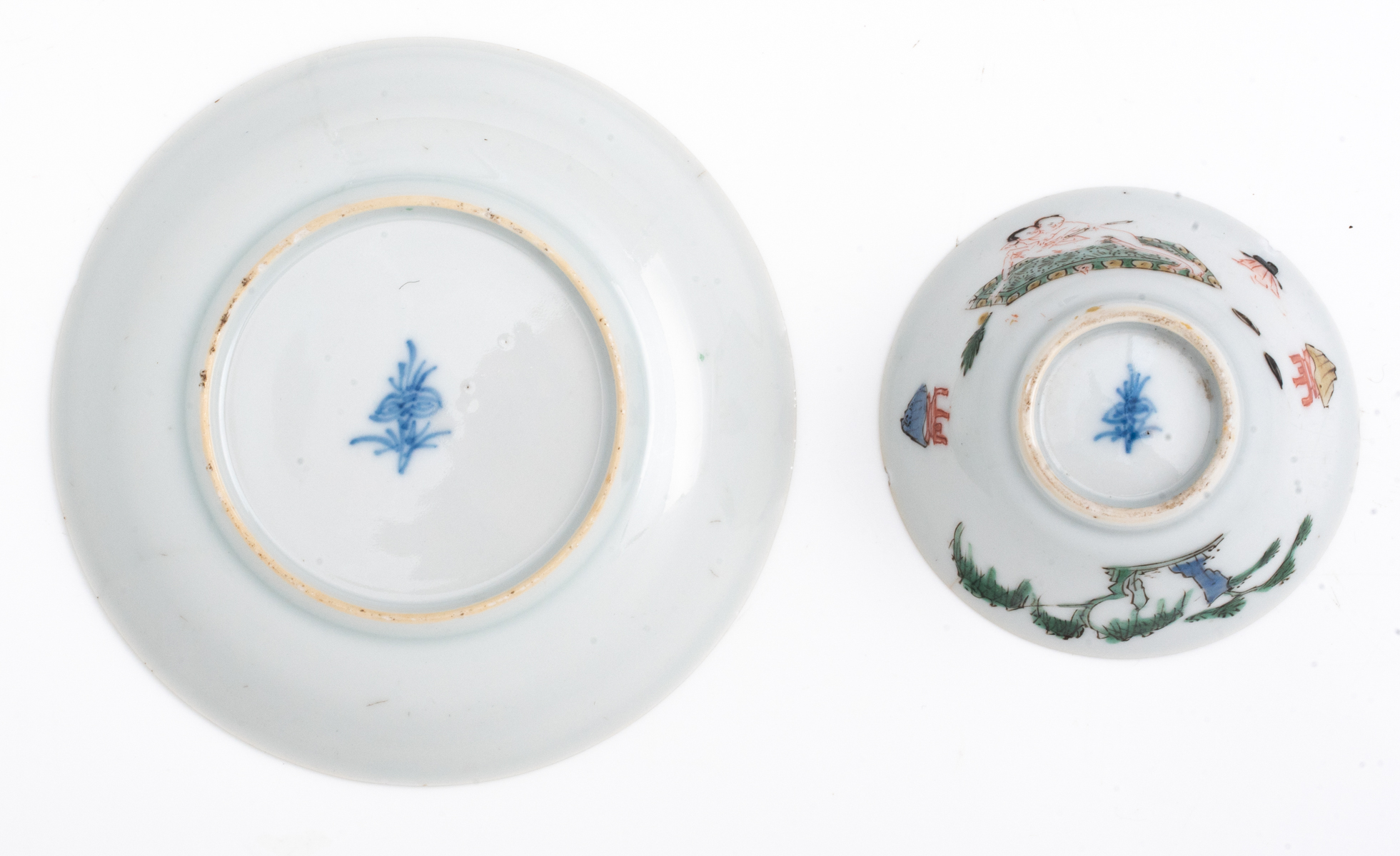 A Chinese famille verte cup and saucer, decorated with an erotic scene, Kangxi symbol mark and of th - Image 4 of 7