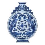 A Chinese blue and white bianhu moonflask, decorated with dragons, chasing the flaming pearl, with a