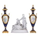 A pair of covered bleu royale ground Sèvres type vases, the roundels with hand-painted gallant scene