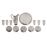 An 800/000 silver seven-piece lemonade set consisting of six goblets and an ewer with a twisted ivor