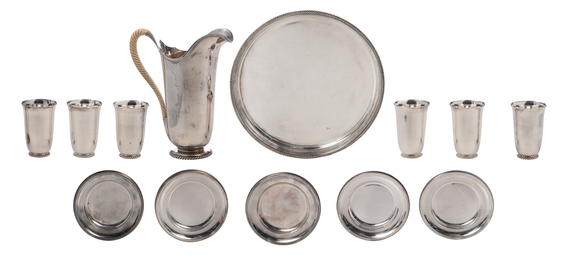 An 800/000 silver seven-piece lemonade set consisting of six goblets and an ewer with a twisted ivor