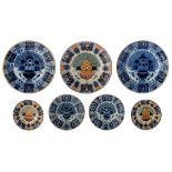 A collection of seven 18thC Dutch Delftware dishes and plates with a peacock tail decoration, consis