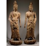 A pair of Chinese Song-style polychrome painted wooden sculptures of standing Guanyin bodhisattvas,