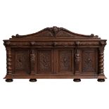 An imposing and large oak sideboard, the four doors, separated by two caryatides, each with a Renais