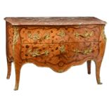 A fine mahogany veneered Louis XV style commode, with floral marquetery of rosewood, gilt bronze mou