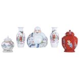 A pair of Chinese famille rose vases and a ditto covered vase, decorated with playing children, mark