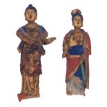 Two Oriental polychrome and gilt decorated earthenware figures, depicting standing deities, H 29 - 3