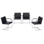 A set of four black leather upholstered Brno chairs, design by Ludwig Mies van der Rohe for Knoll In