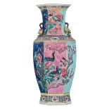 A Chinese famille rose hexagonal vase, one side decorated with antiquities such as scholar's scrolls