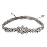 An 18ct white gold ladies' bracelet in the Art Deco style set with various smaller brilliant-cut dia
