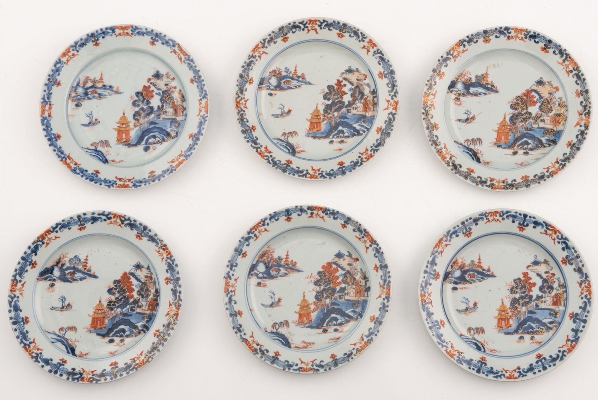 Six Chinese Imari decorated dishes, the centre with a pagoda in a mountainous river landscape, 18thC - Image 4 of 6