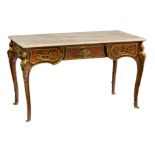 A walnut veneered Louis XV style 'bureau plat à double face', with gilt bronze mounts and on top a p