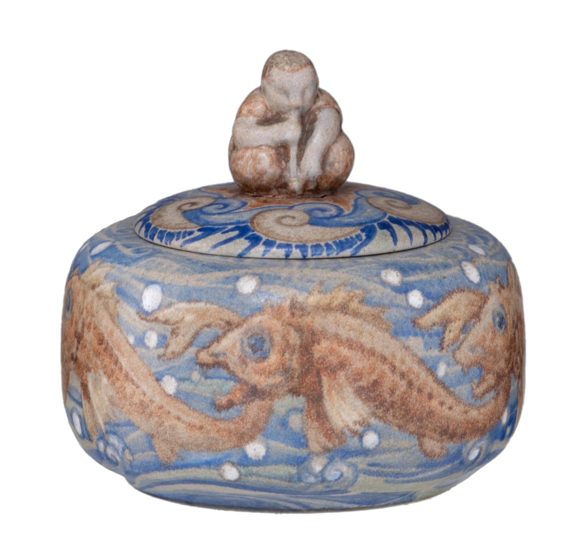 A Japanese inspired ceramic covered bowl, decorated with koi and on top a sitting figure, signed and