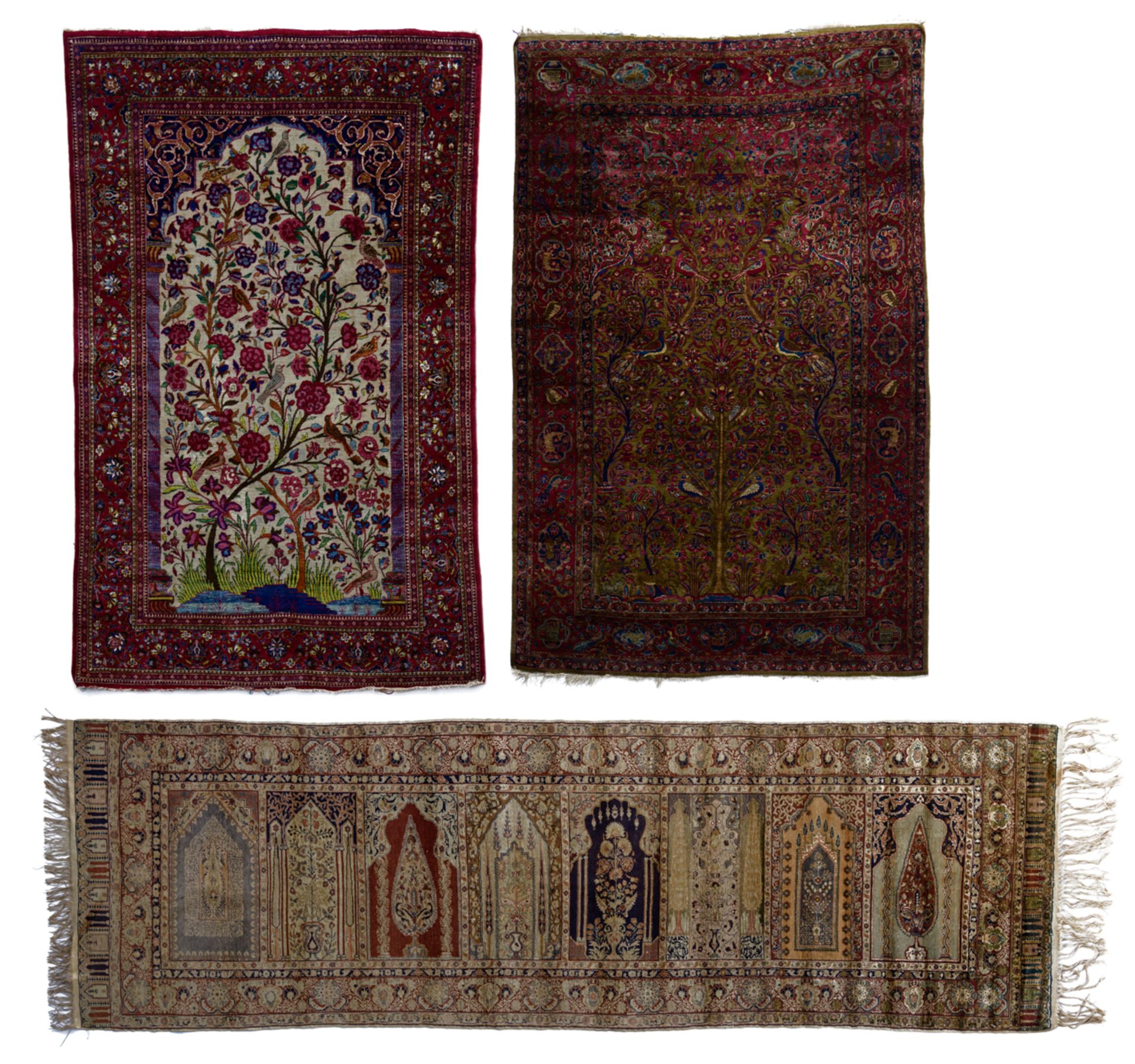 An Oriental silk rug decorated with birds in trees; added: an Oriental silk rug decorated with the t