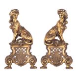 A fine pair of gilt bronze Louis XIV style andirons set with sphinxes on top, H 40 - W 20 cm