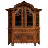 An imposing and richly sculpted oak Rococo style two-part display cupboard, H 255 - W 230 - D 69 cm