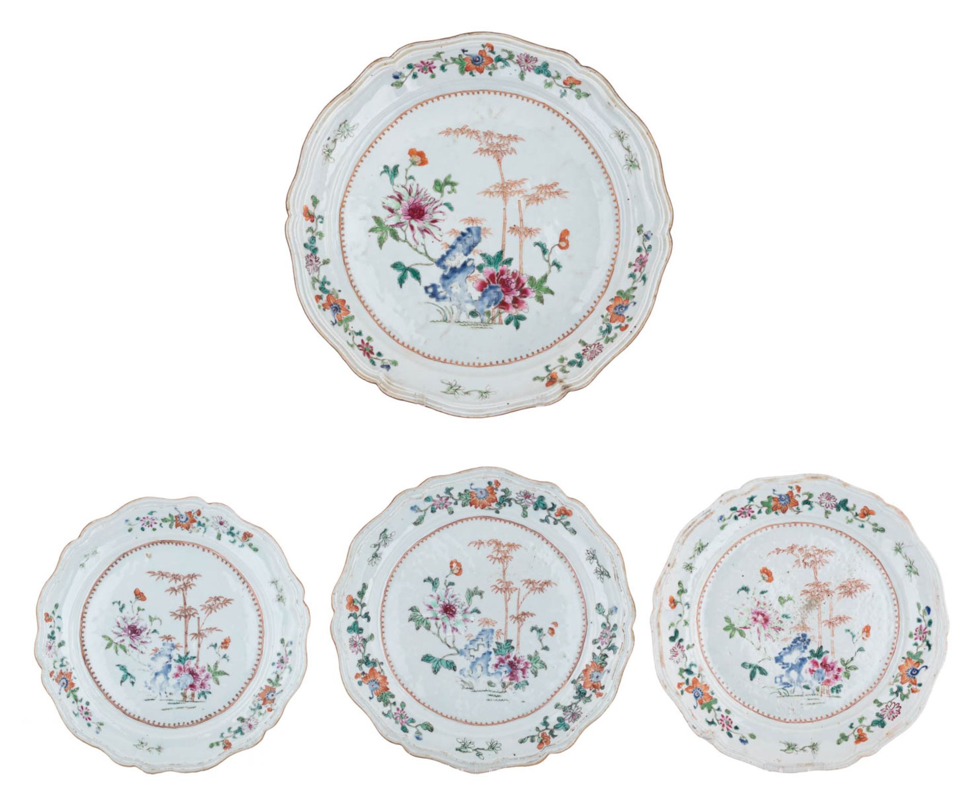 Three Chinees famille rose flower-shaped export porcelain plates