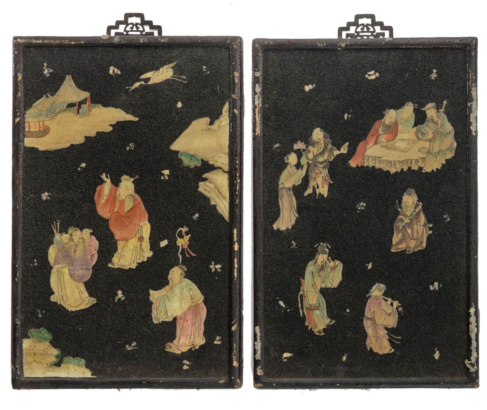 Two wall panels decorated with translucent lacquer set on a painted garden scene