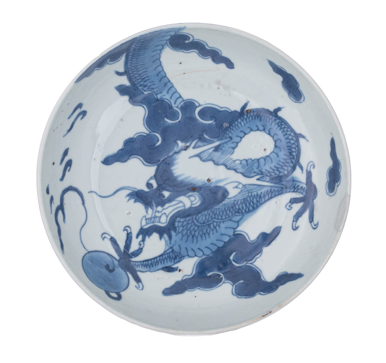 A Chinese blue and white dragon dish