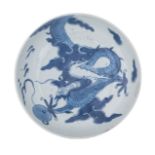 A Chinese blue and white dragon dish