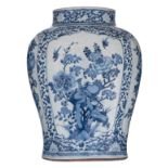 A Chinese blue and white floral decorated vase