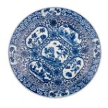 A large Chinese blue and white floral decorated plate